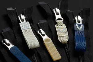 YKK riceve il Red Dot Award per una linguetta per cerniere stampata in 3D